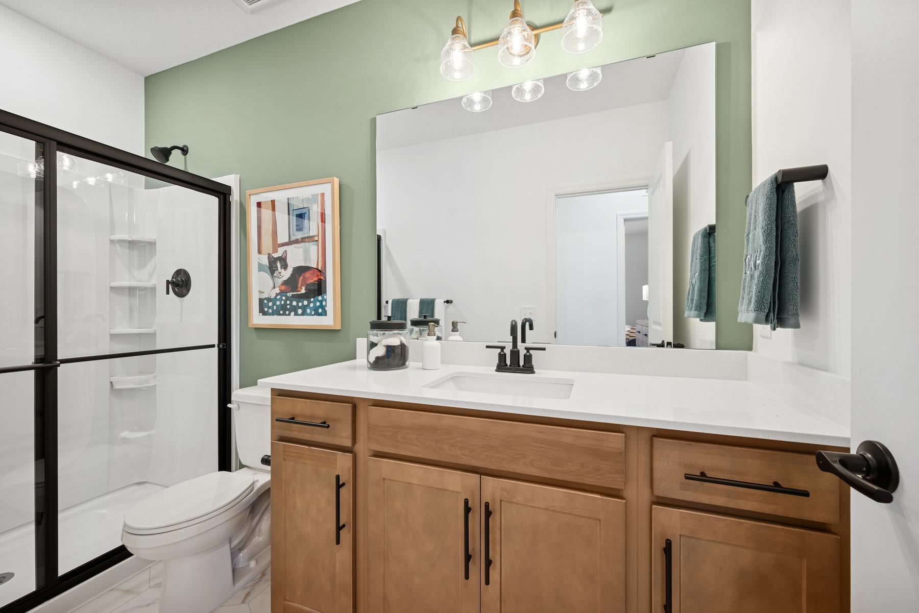 3/4 bath in Basement. Photo of Model Home - Same plan