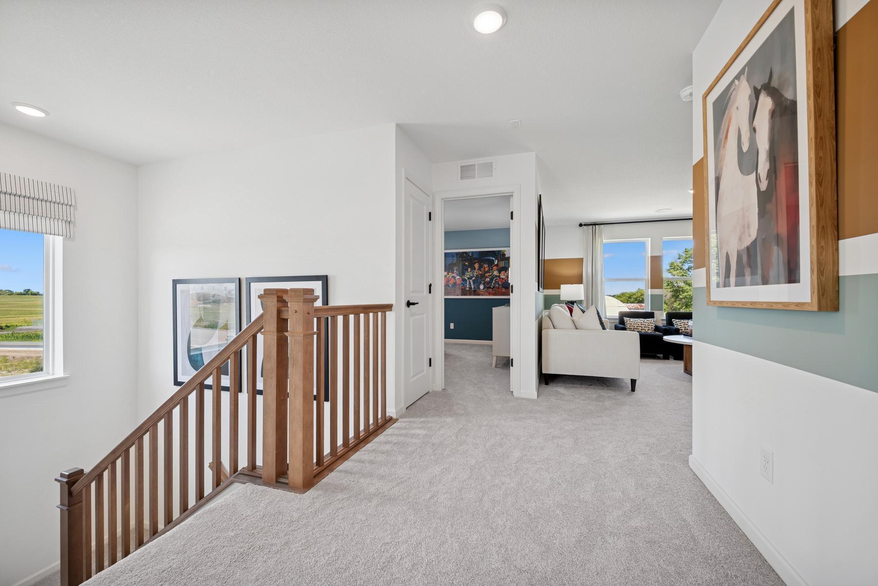 Top floor into loft space. Photo of Model Home - Same Plan