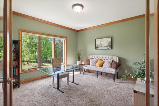Convenient main level office space or den