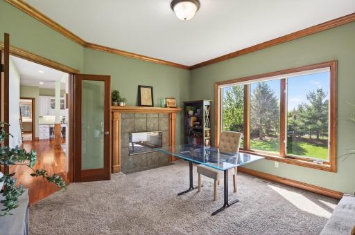 Convenient main level office space or den