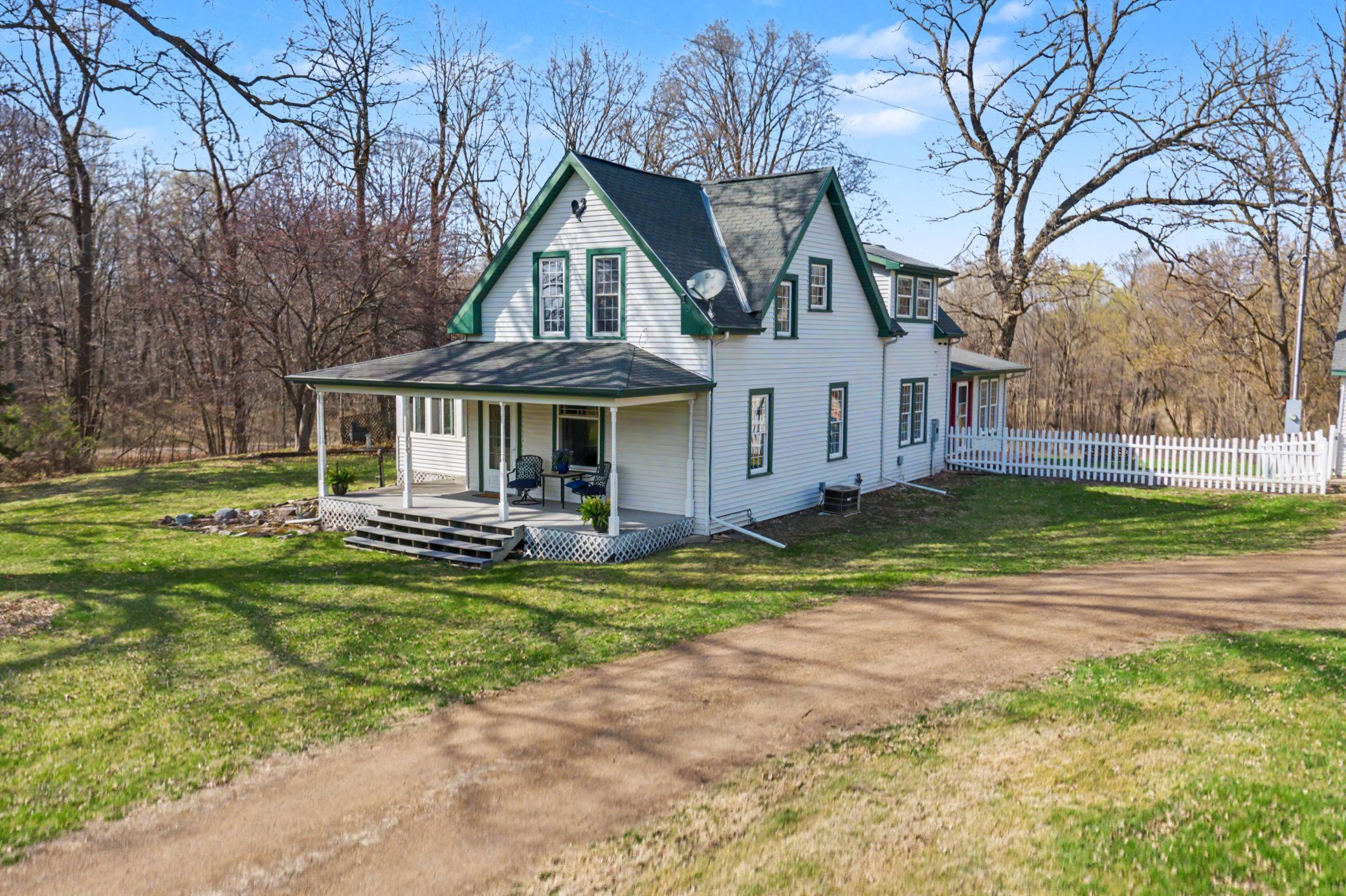 A classic 2 story farm house with wrap around covered porch are always a welcome retreat to come home to after a long day.