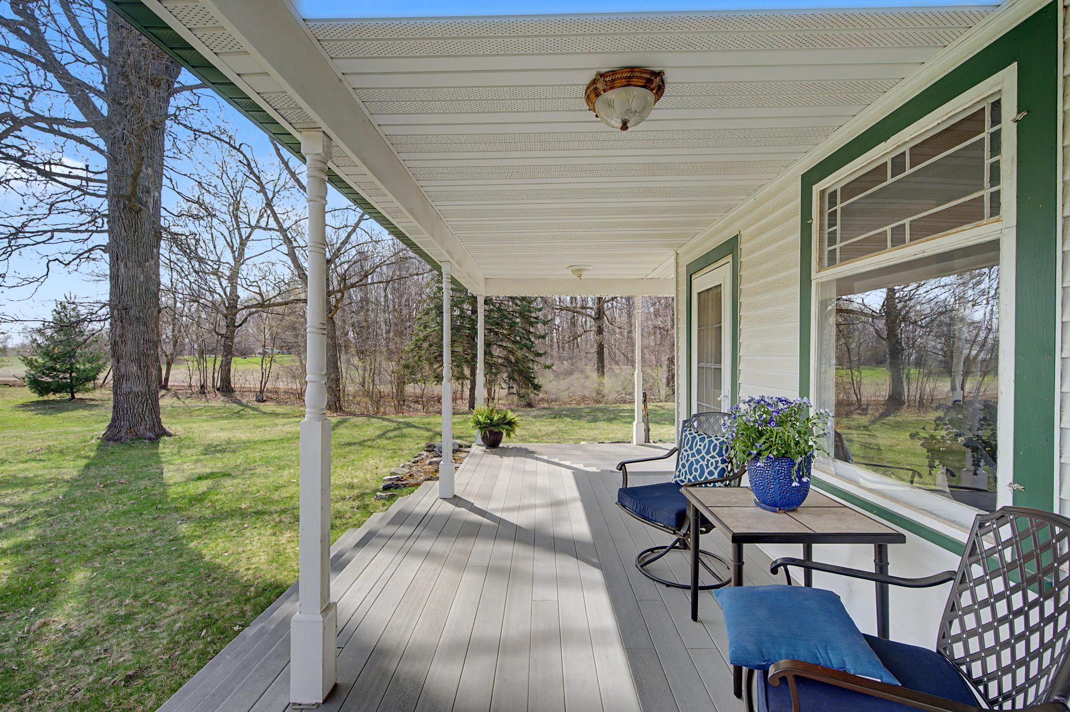 The perfect place to sip icedtea on a hot summer's day or enjoy a glass of wine as the sunsets and the day draws to an end under this covered wrap around porch