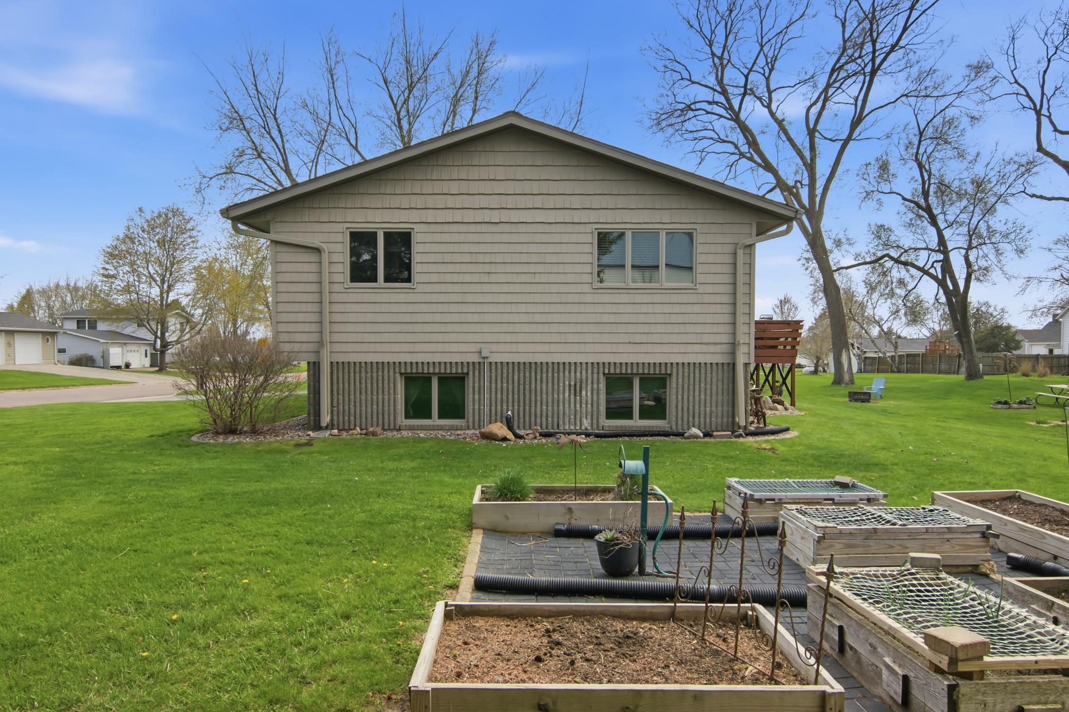 Side Exterior & Raised Gardens