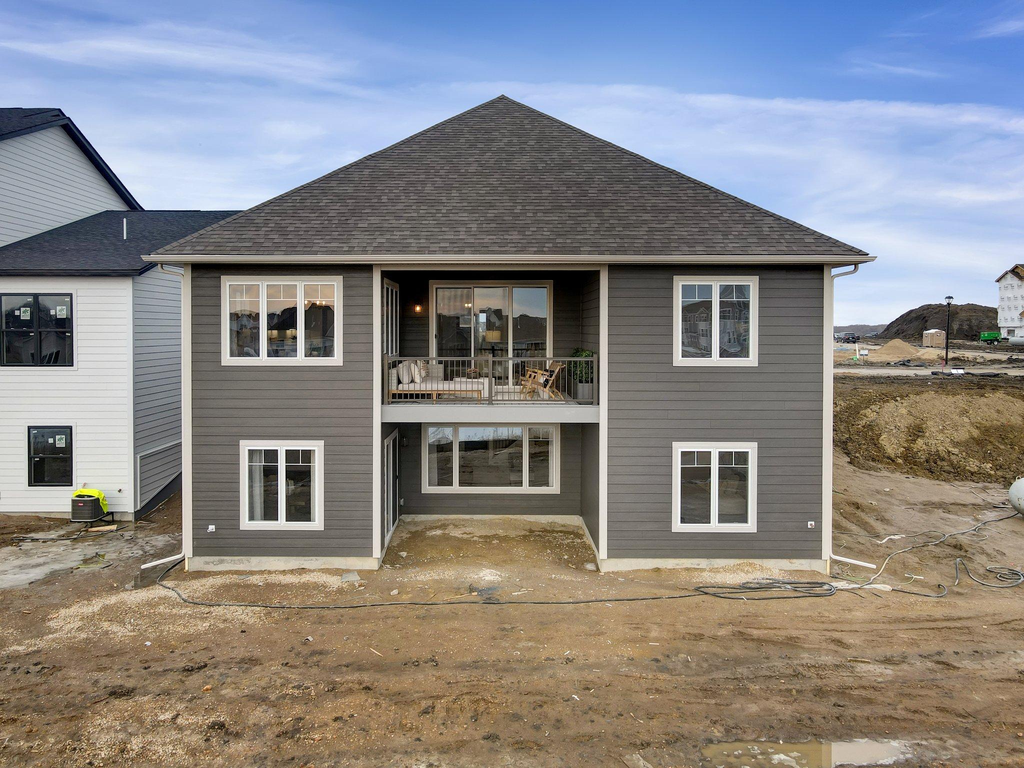 Two levels to enjoy the outdoors, with a deck above and walkout below that makes the space feel twice as usable - *Photo of model home, options and design selections may vary
