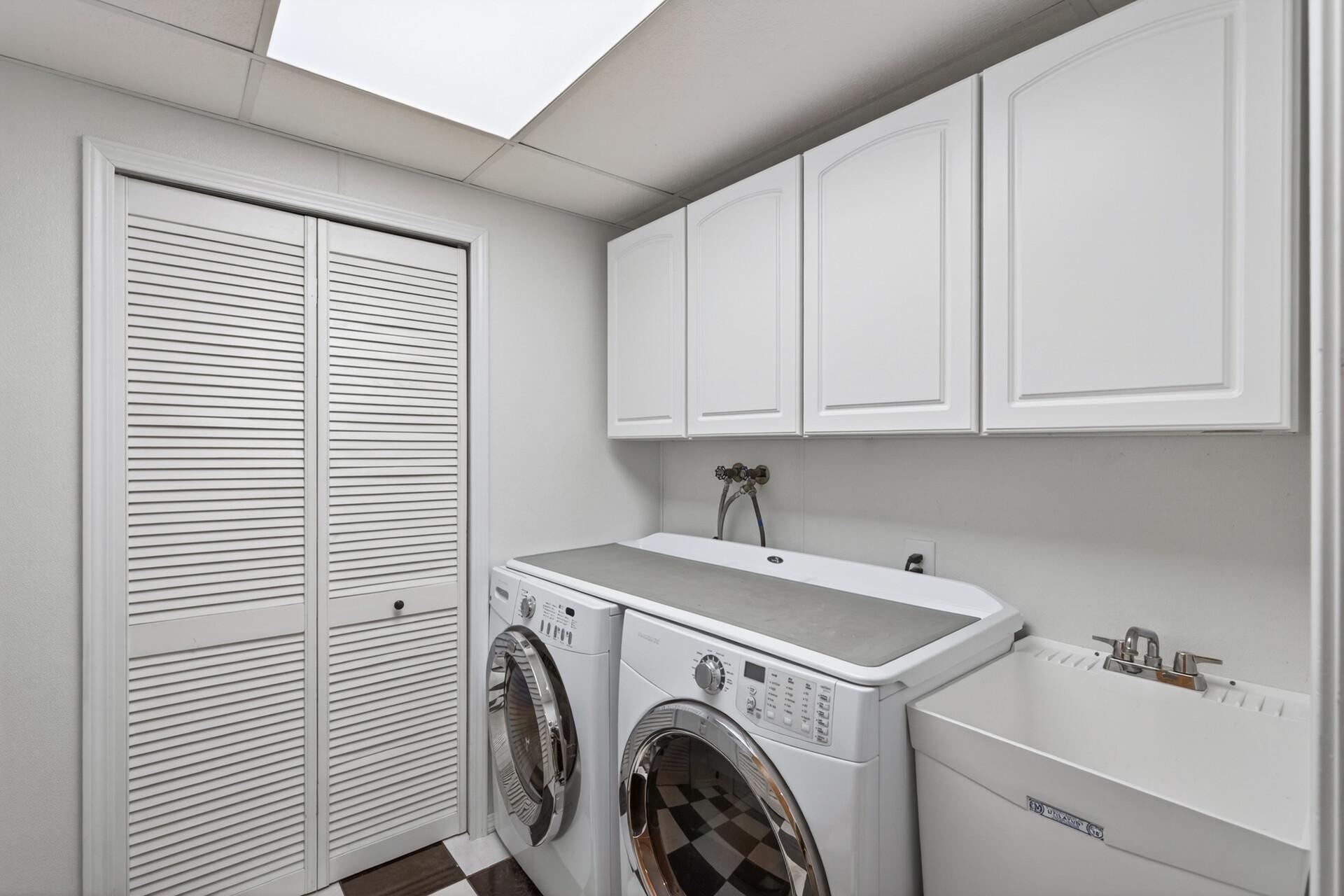 Upgraded front load washer and gas dryer with even more storage.