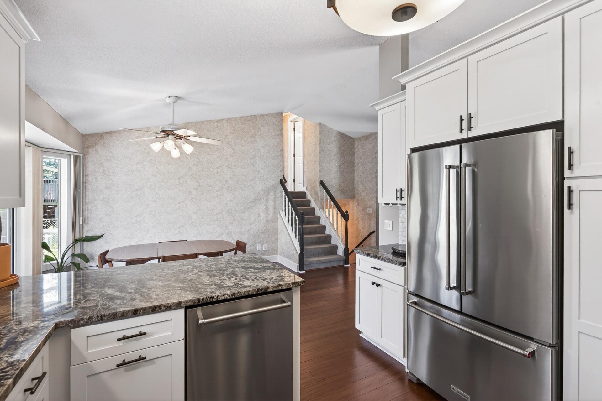 Open and functional kitchen layout with ample storage.