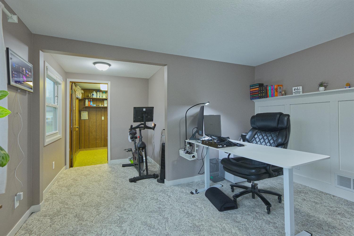 Den/current office into laundry