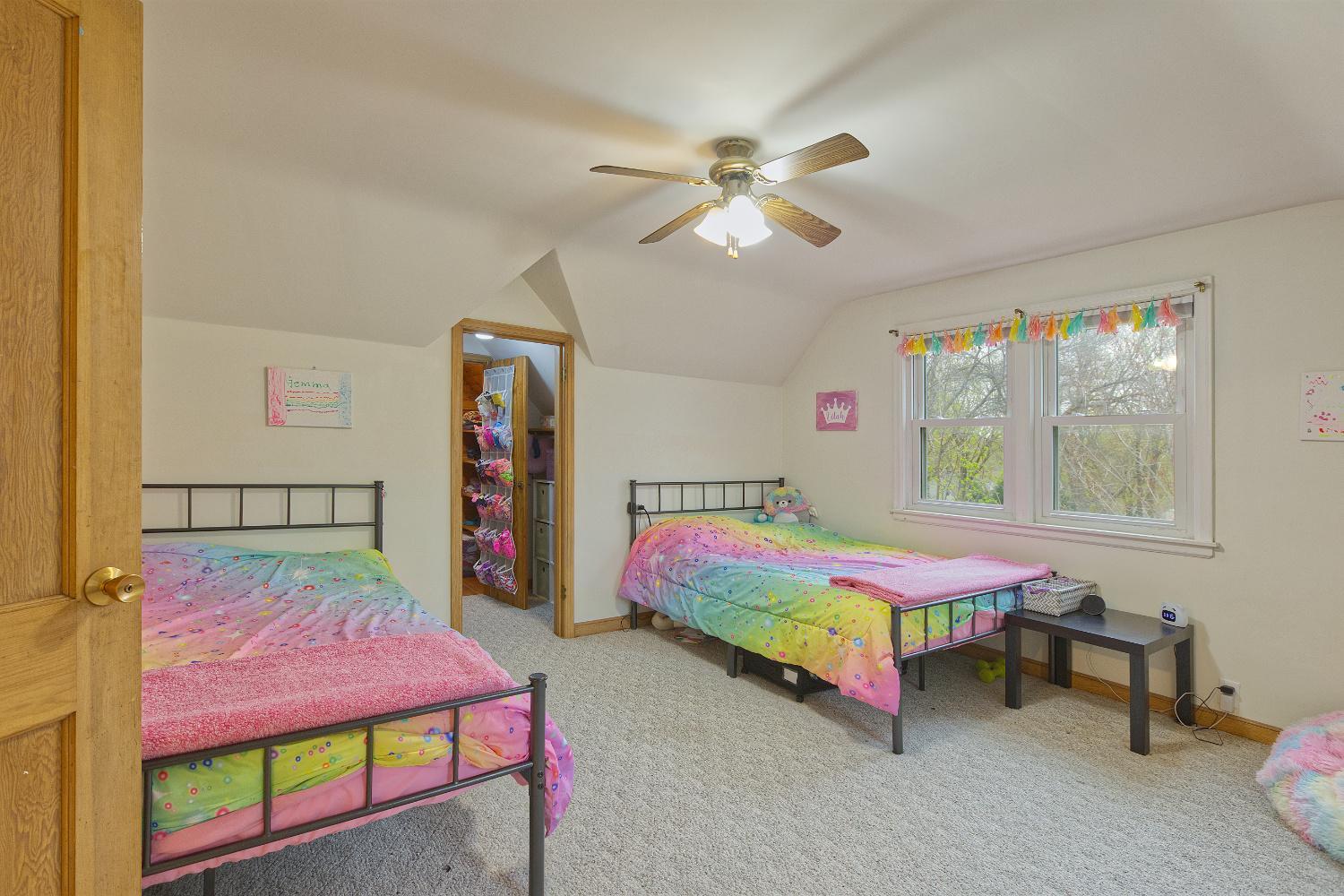 Upper level bedroom with walk in closet