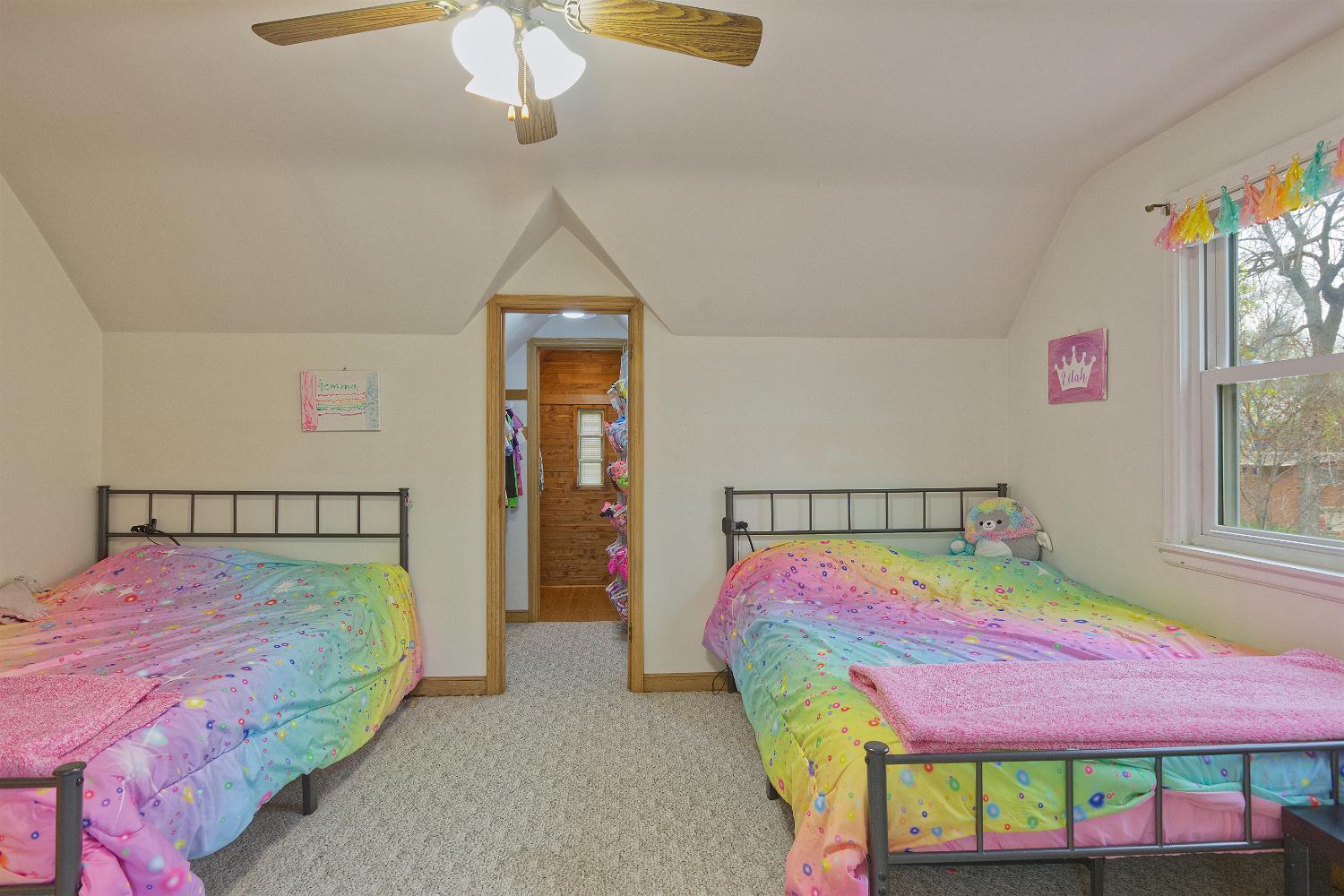 Upper level bedroom with walk in closet