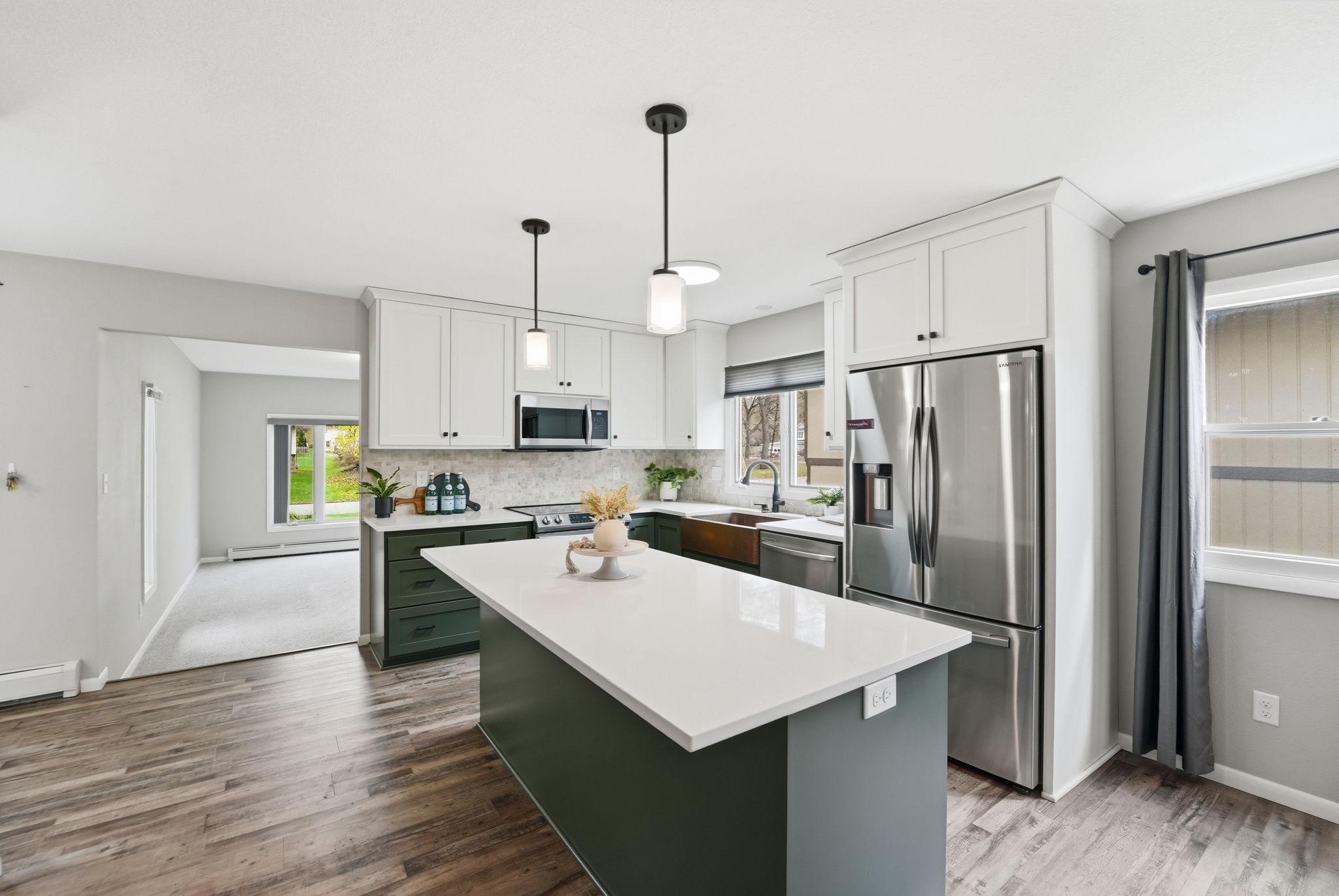 Stainless steel appliances and quartz countertops