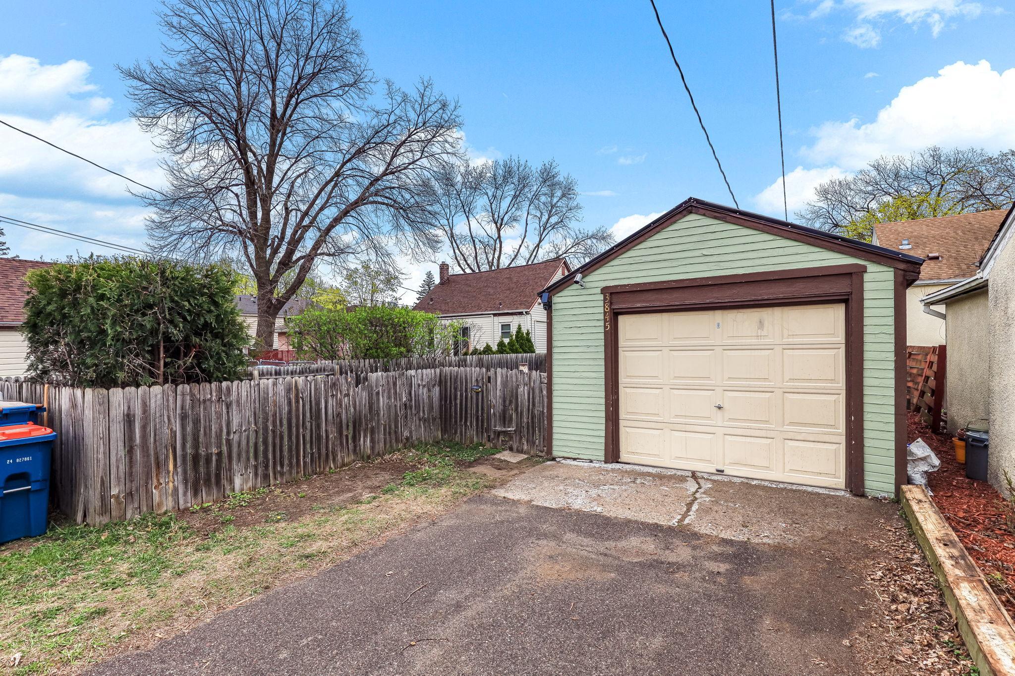 One car garage plus additional driveway to get two cars off the street