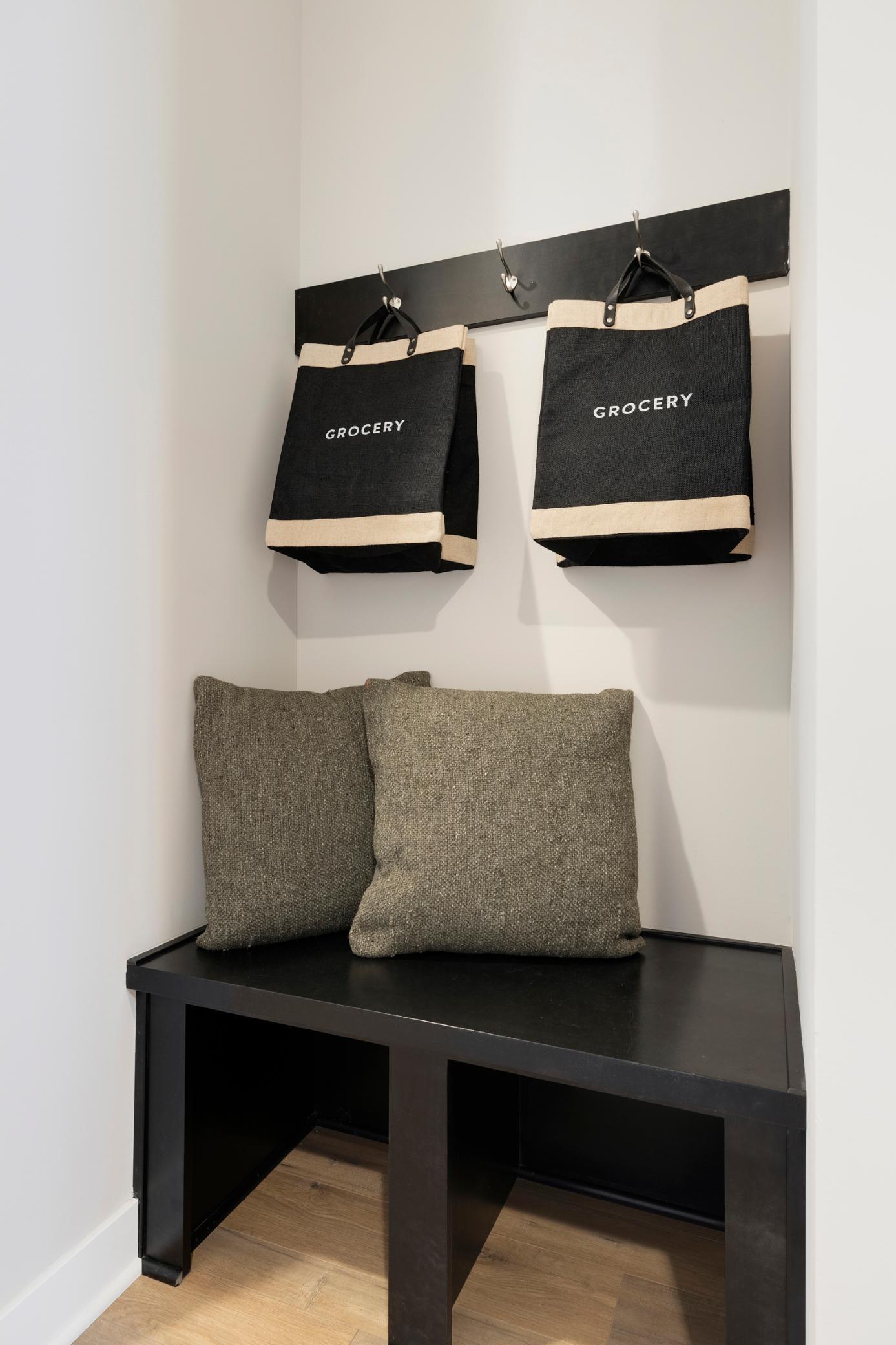 Built-in boot bench. Photo is of a similar model home.