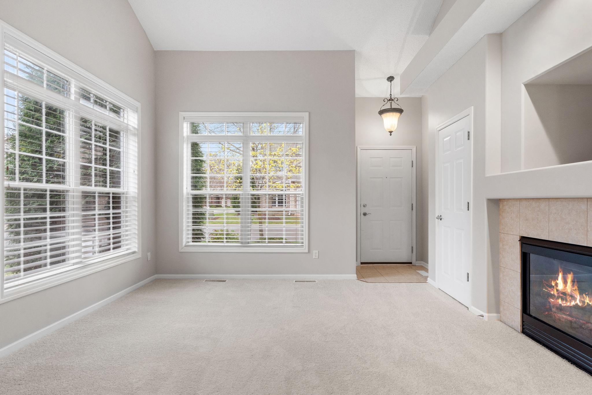 Large windows make the space feel light and airy