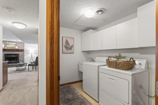 Laundry room is located on the lower level