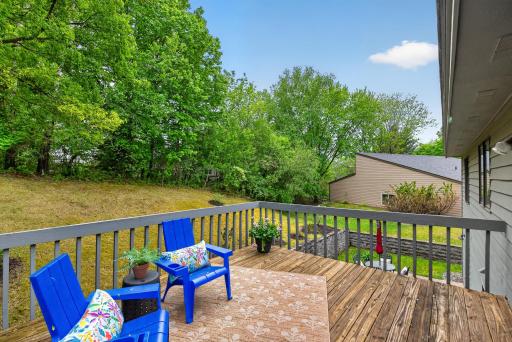 The deck overlooks the private patio area below
