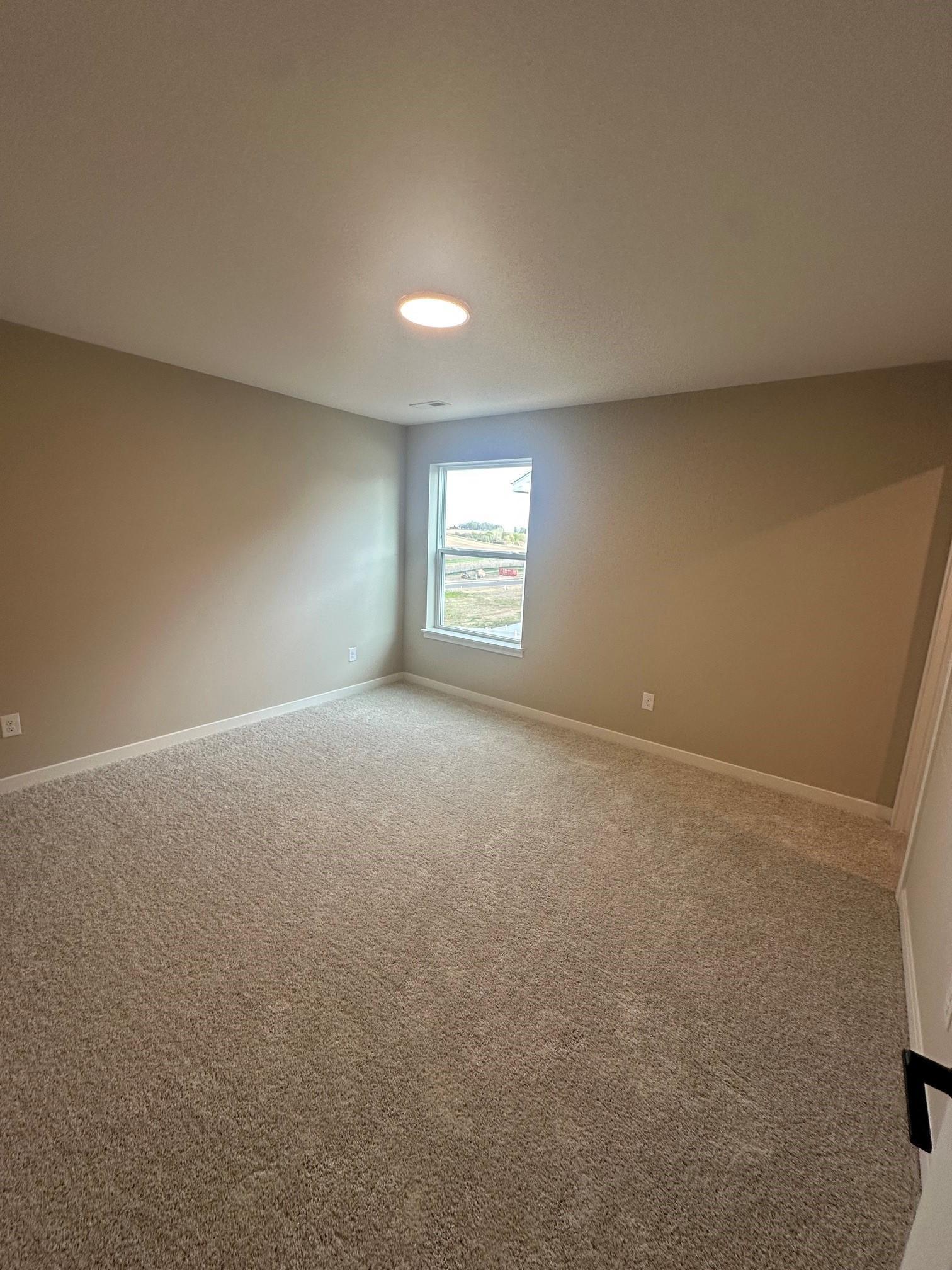 Secondary Bedroom with Large walk in closet.jpg