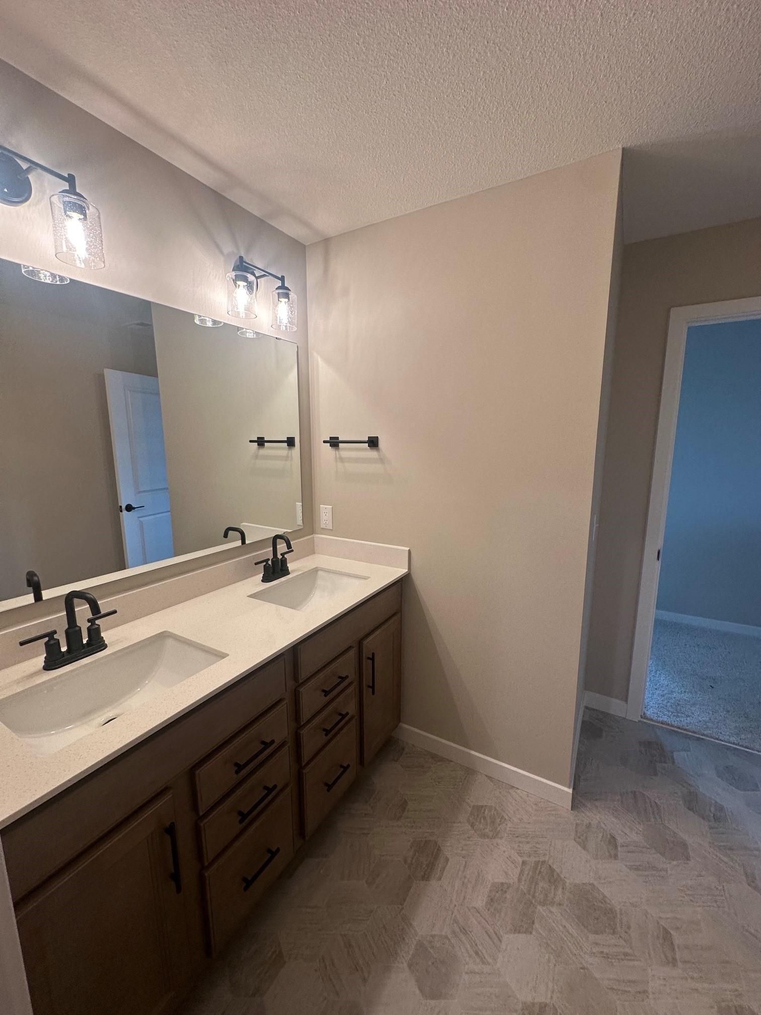 Main hall bath with two sinks.jpg