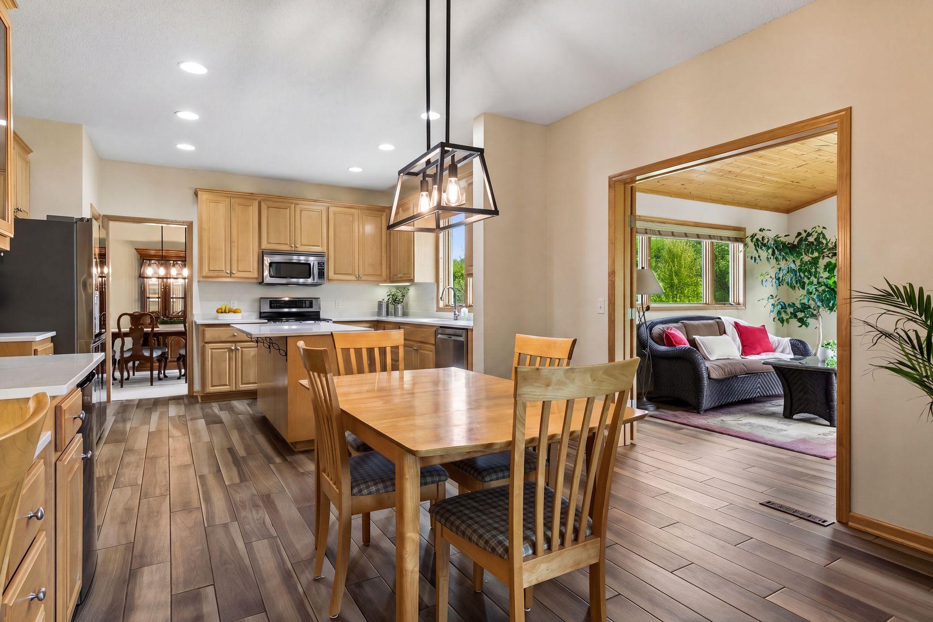 Kitchen opens to Sunroom