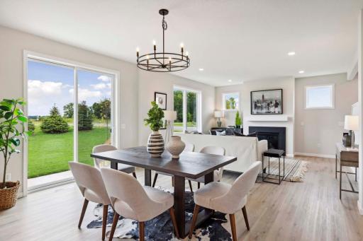 Lots of windows! Photos and/or illustrations are of like home and may not depict actual home plan configurations. Features, materials and finishes may contain options that are not included in price.