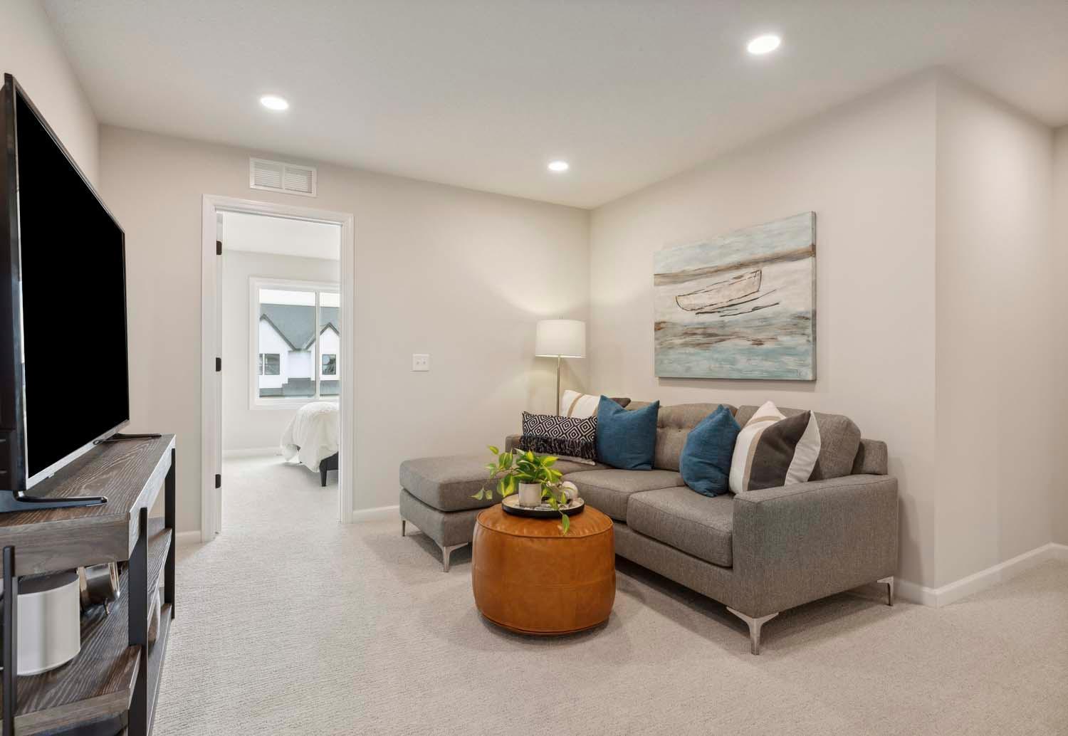 Second floor loft. Photos and/or illustrations are of like home and may not depict actual home plan configurations. Features, materials and finishes may contain options that are not included in price.