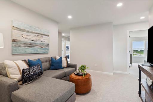Loft is open to four upper level bedrooms. Photos and/or illustrations are of like home and may not depict actual home plan configurations. Features, materials and finishes may contain options that are not included in price.