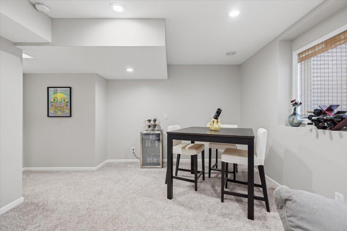 Most furniture throughout the home is open for negotiation - including this lower level table and chairs.