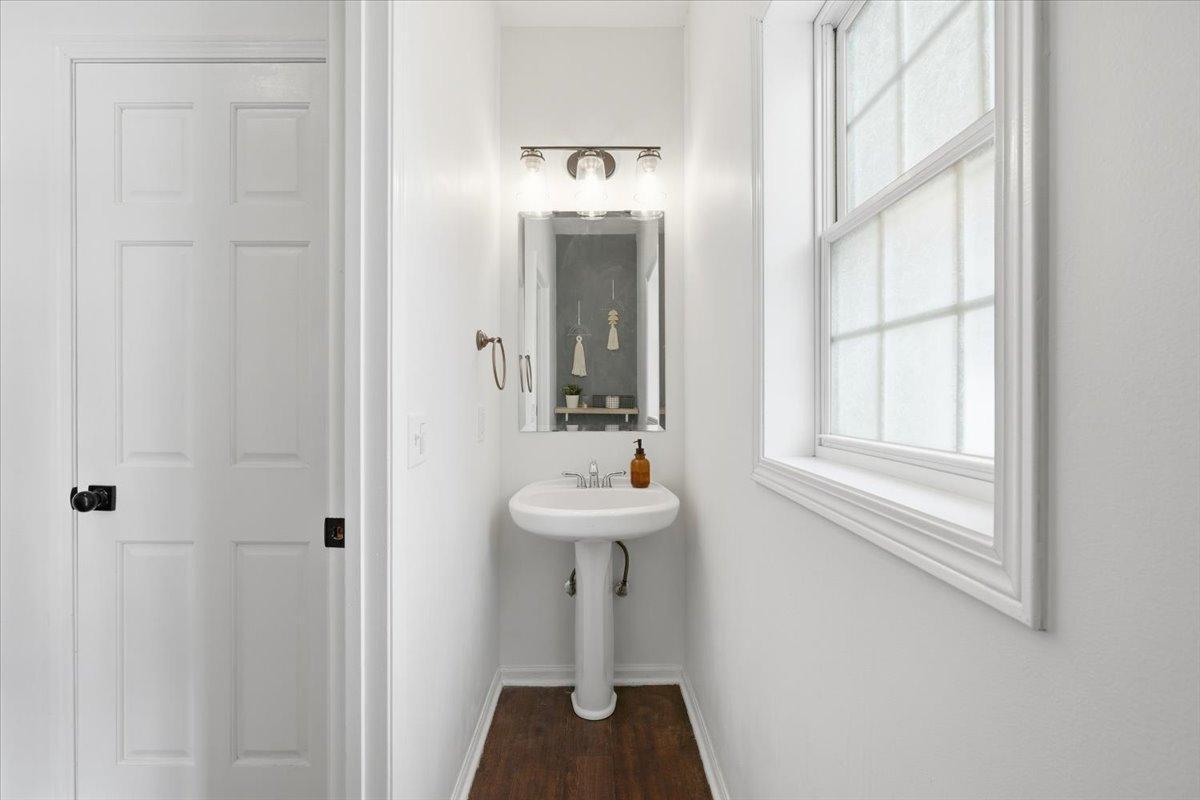 The powder room on the main level offers a half bath, perfect for entertaining family and friends on the main level of the home.