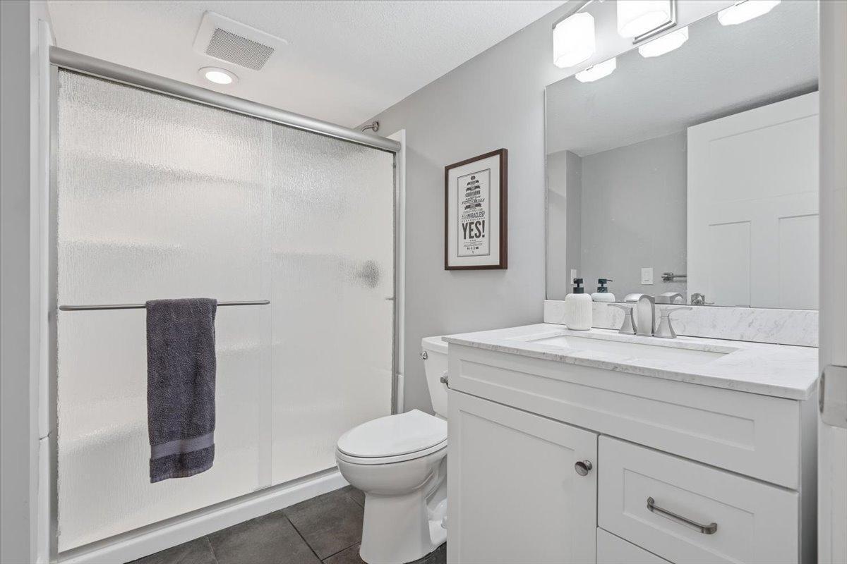 Tucked right next to the lower level bedroom is a complete, updated 3/4 bath.
