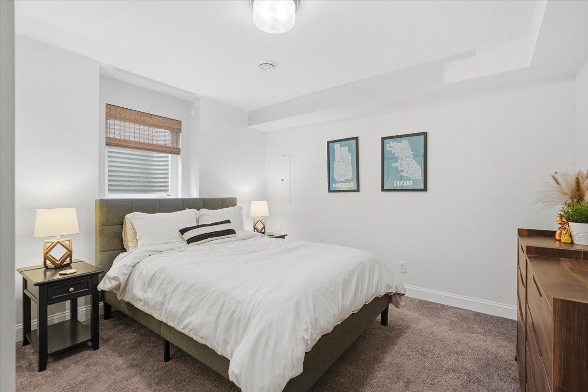 The lower level fifth bedroom offer privacy and a quiet retreat. The perfect guest space. The entire room set up is open for negotiations with the sellers.