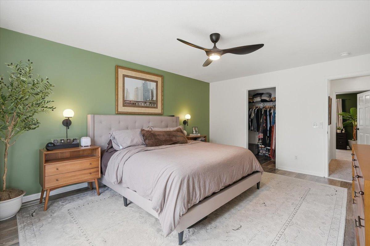 This primary suite is the ultimate owners retreat, complete with a walk-in closet and large windows (and black-out curtains!)