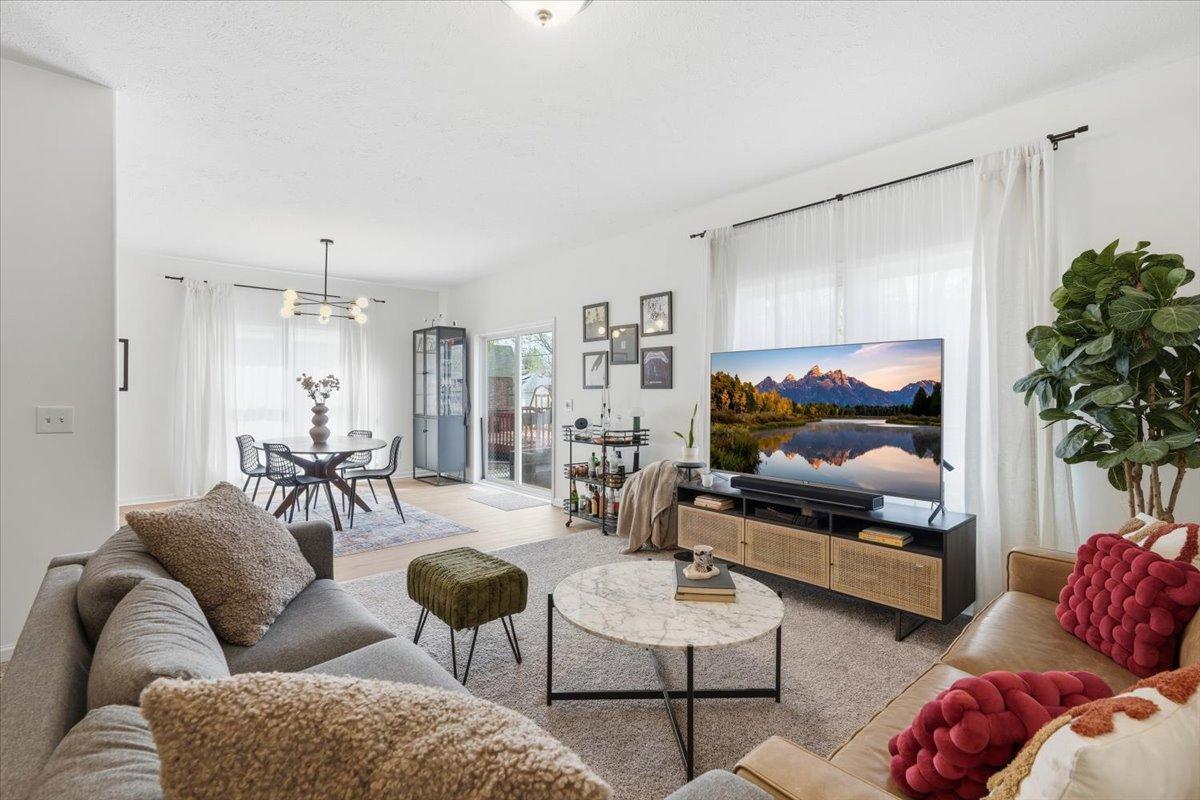 From the main level family room, you can see the easy flow into the dining room attached to the kitchen