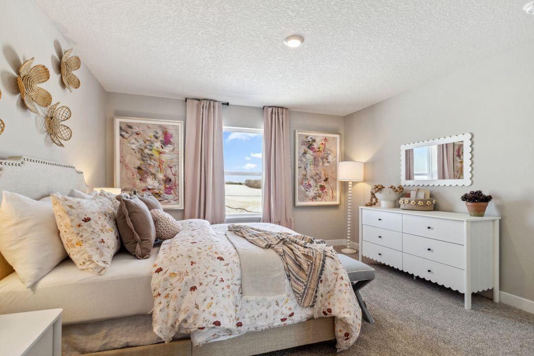Each of the home's three secondary upper-level bedrooms are spacious, and each have immediate access to their own bath - two of which share a Jack and Jill! Model home, color and finish will vary.