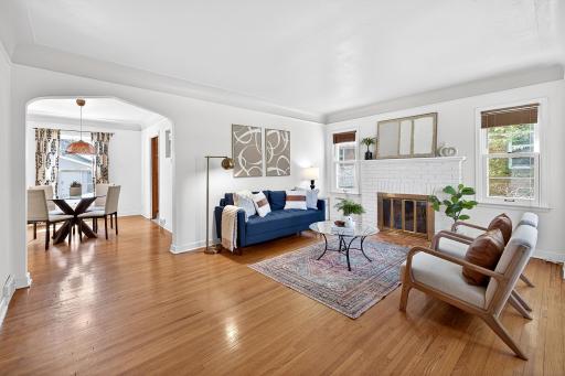 Living room flows nicely into dining room - great for entertaining and modern living!