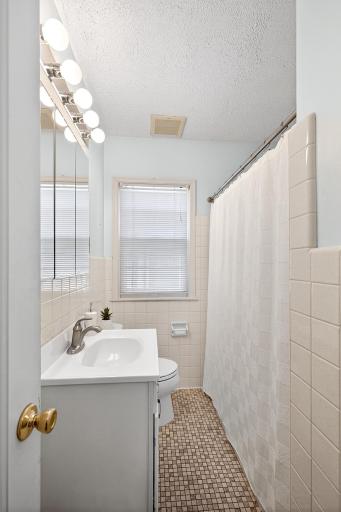 Perfectly vintage main floor full bathroom.