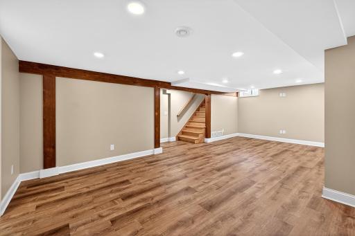 Extensive lower level remodel with family room, bedroom, laundry room and new electrical panel!