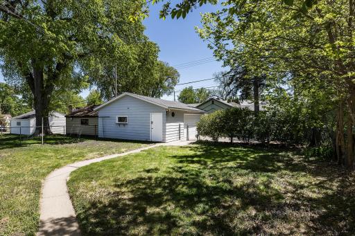 Fully fenced backyard with over sized two car garage.