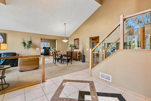 Vaulted ceilings extend into Living Room and Dining Rooms