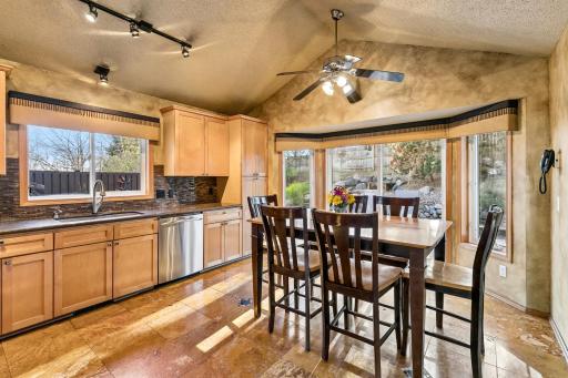 Vaulted ceiling, soft close drawers, space for dining, sliding glass doors to deck