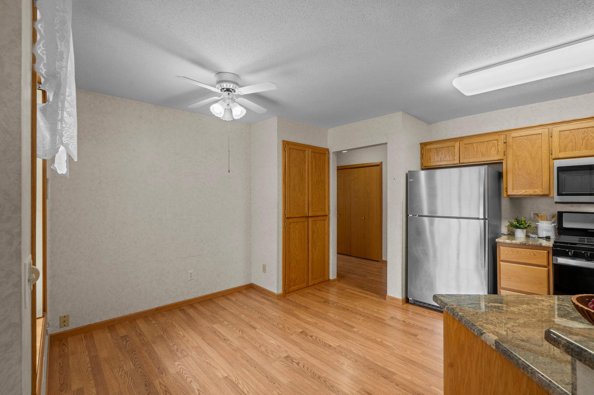 Low maintenance flooring in the kitchen, eat in space and back hallway.