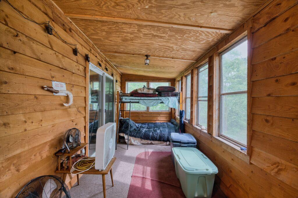 Enclosed Porch with sleeping arrangments
