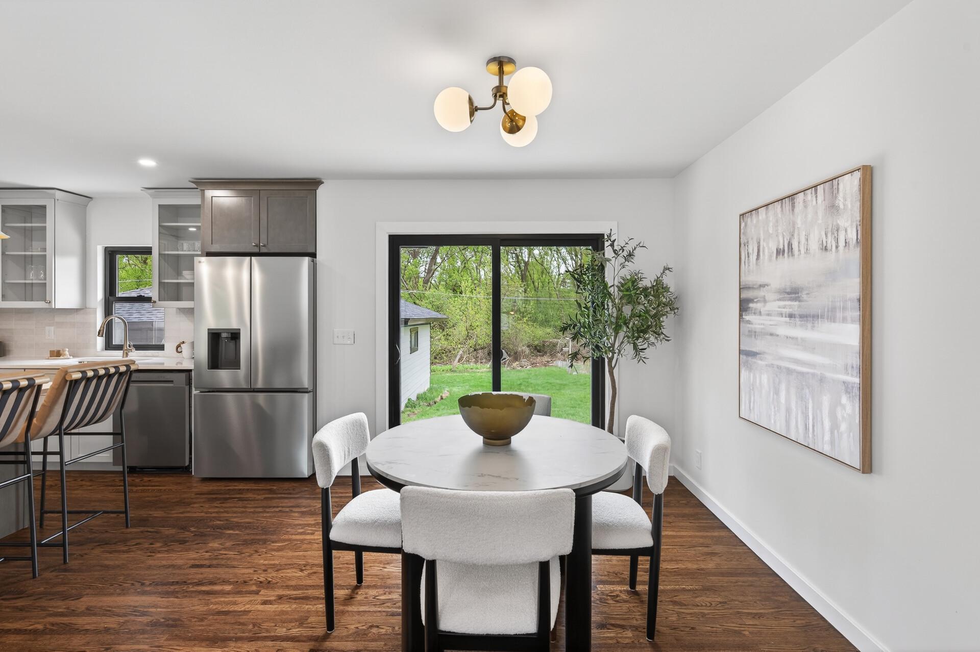 Dining area with view out to the backyard and patio