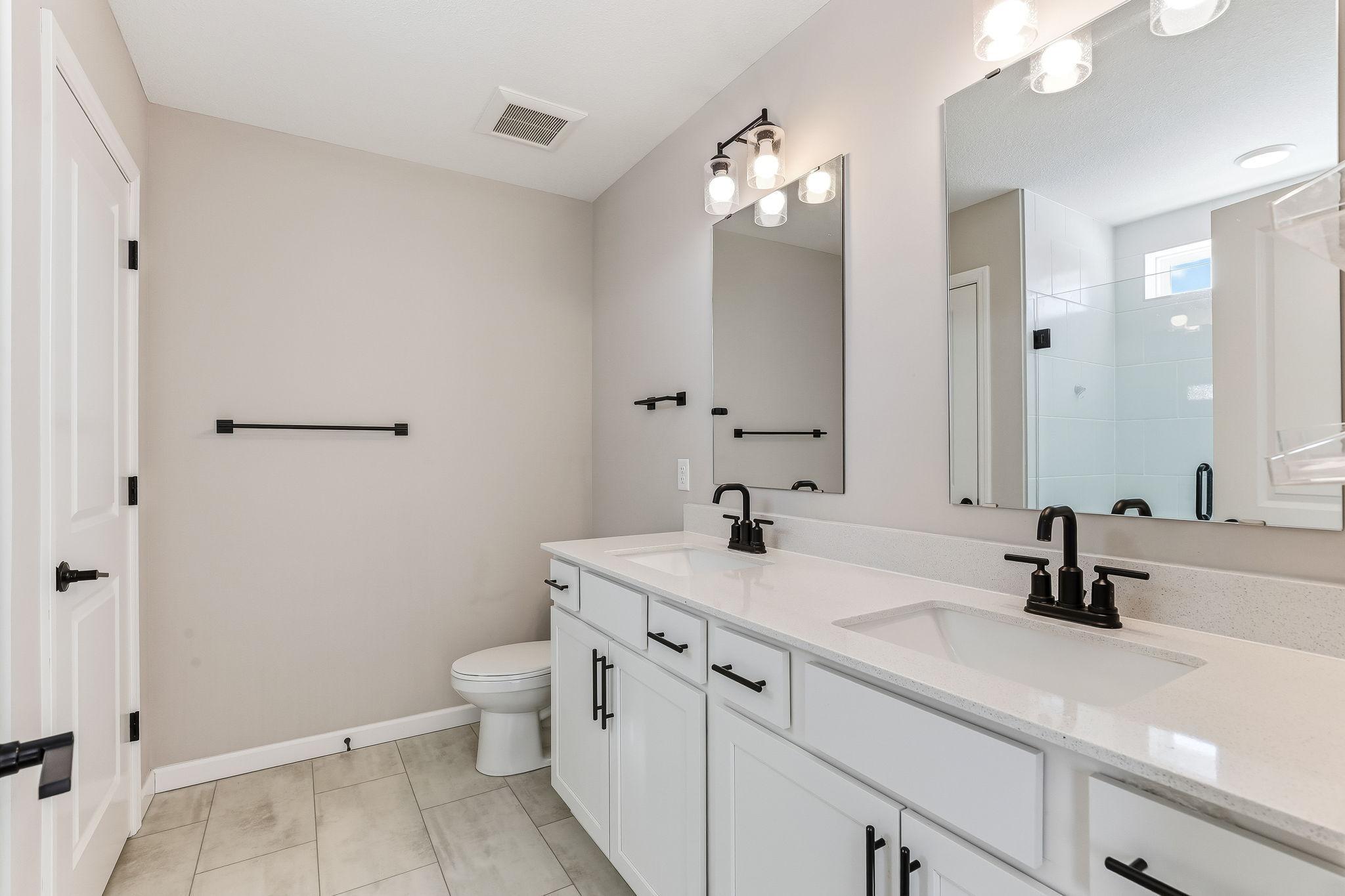 Private Bath with Quartz Top plus Double Sinks!
