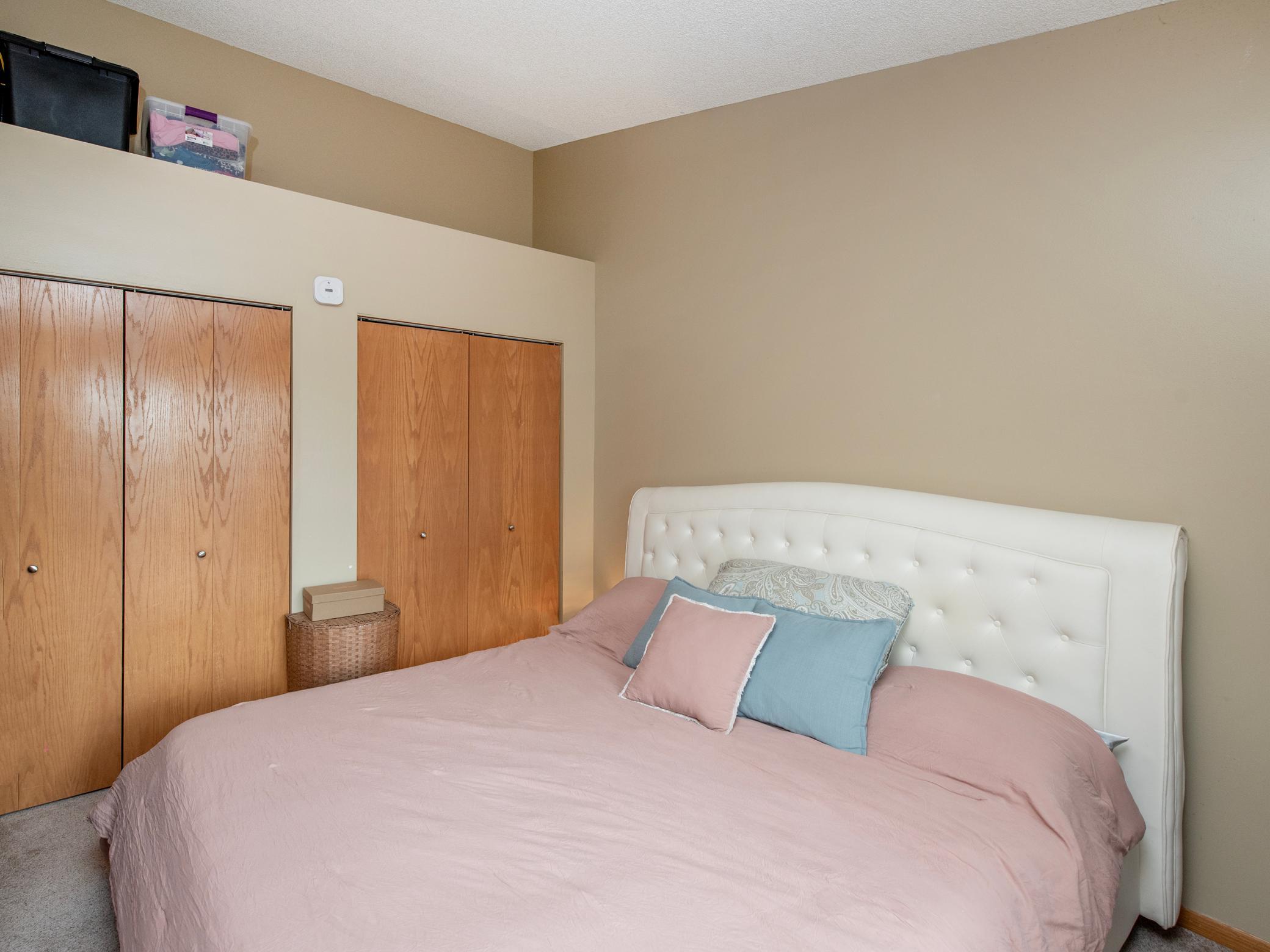 Two closets in primary bedroom.