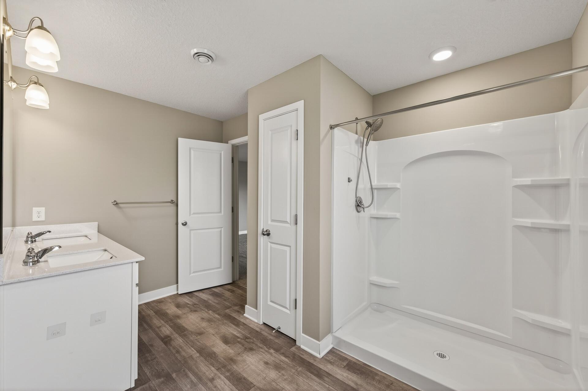 Primary bathroom with large shower.jpg