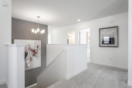 The upper level landing! (Photo is of the actual home.)