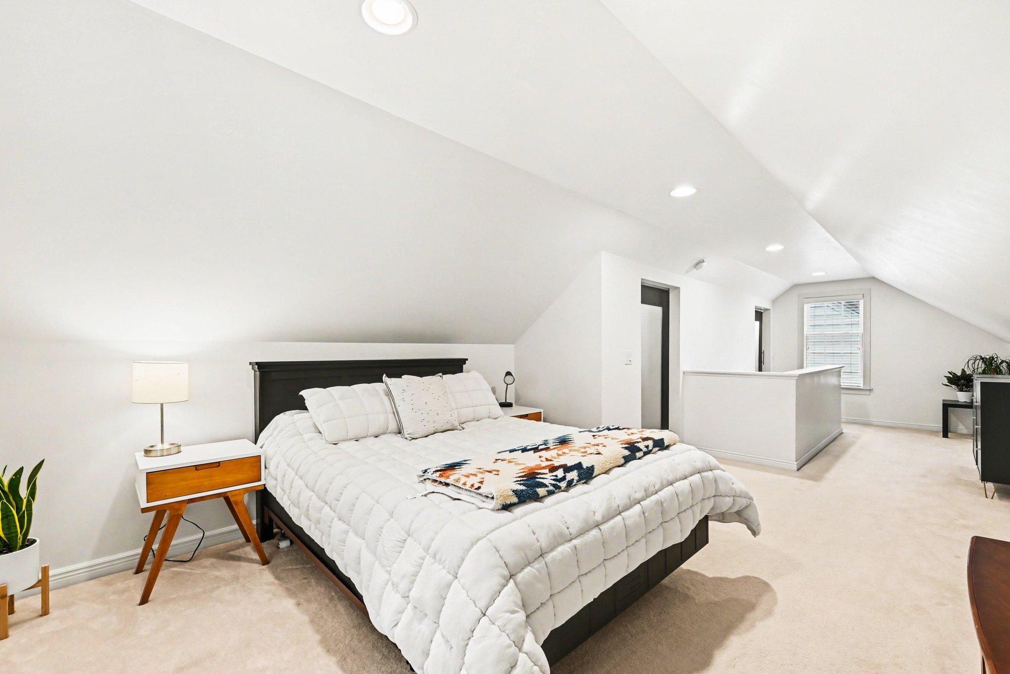 You're going to love this giant upper level bedroom with tall ceilings and plenty of closet space