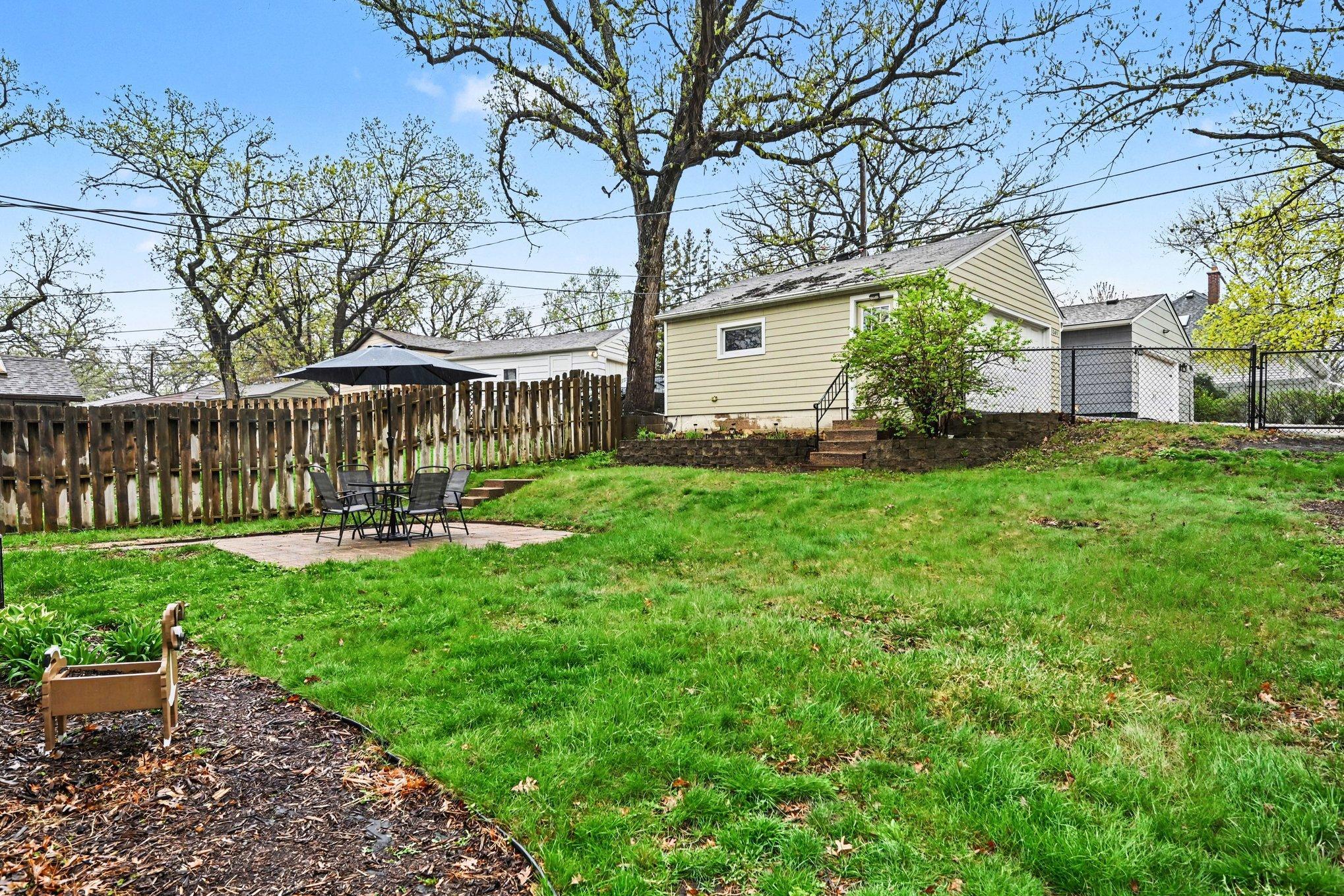 Fenced in corner lot alert! 2 car garage and large driveway