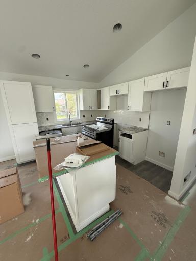 Large kitchen with granite countertops. Appliances will be installed shortly!
