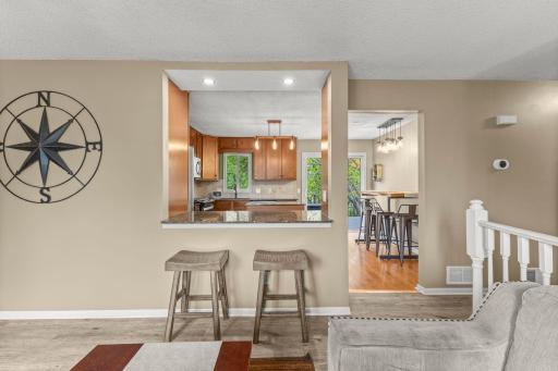Eat-in kitchen with granite countertops.