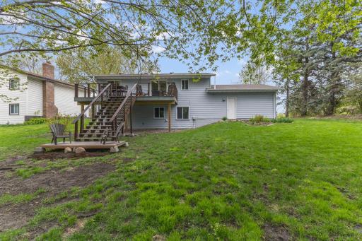 New Trex deck and lower seating area + a spacious yard for entertaining.